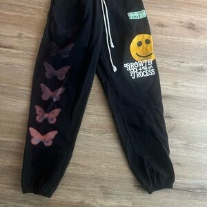 CHNGE Black Sweatpants with Butterfly and Smiley Design